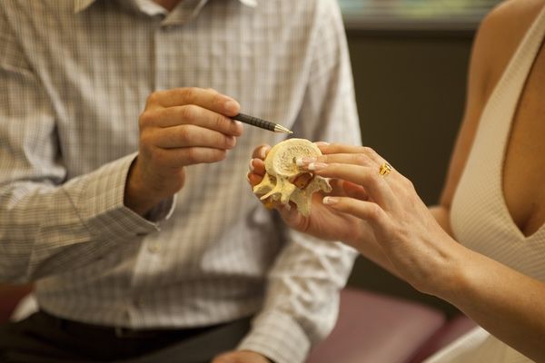 Nanaimo chiropractor discusses spinal health with a client.